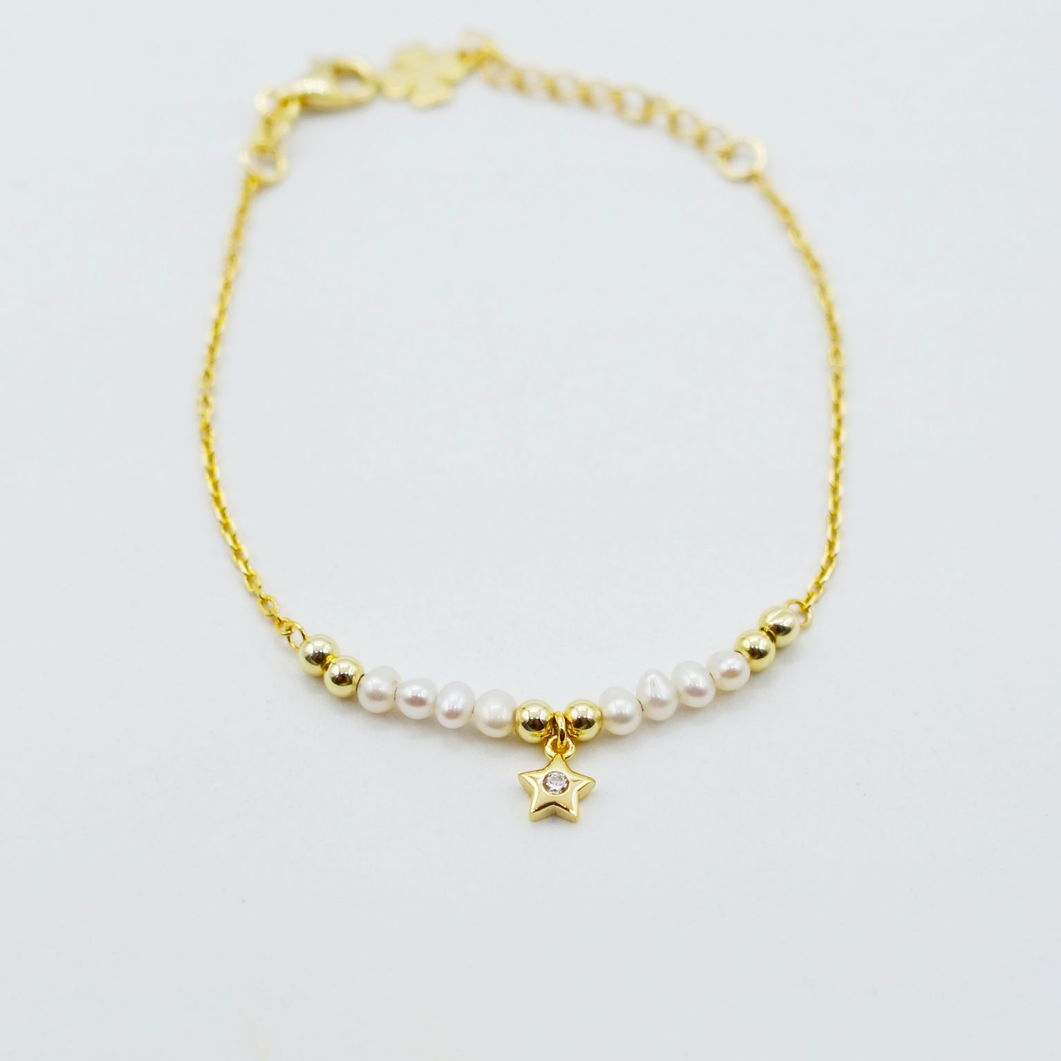 Pulsera estrella y perlas Joyería Gomar